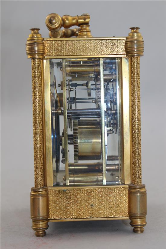 A late 19th century French ormolu hour repeating carriage clock, 7in., with travelling case